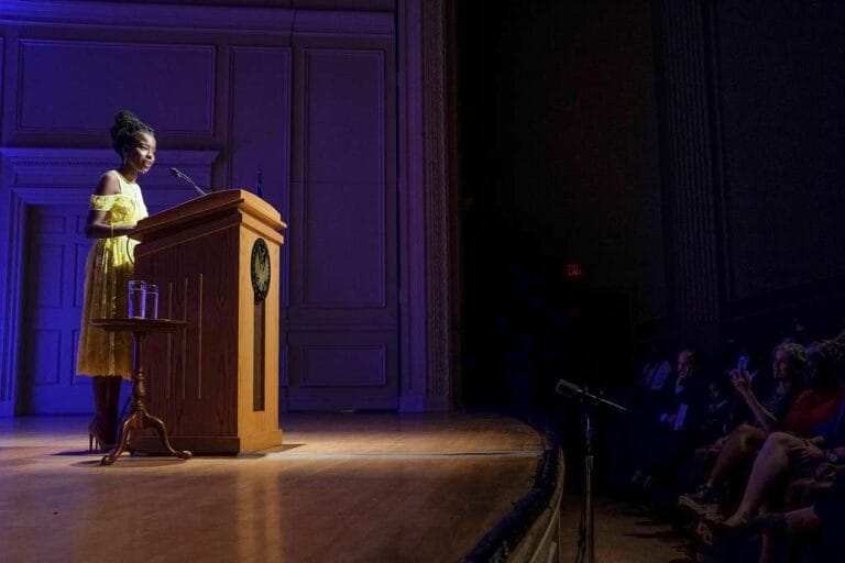 Amanda Gorman Speaking from a podium