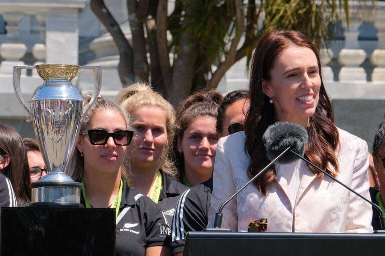 Jacinda speaking in front of a crowd